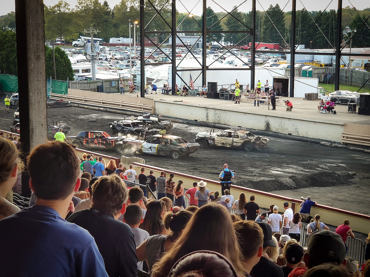 Junk car racing and crowd watching
