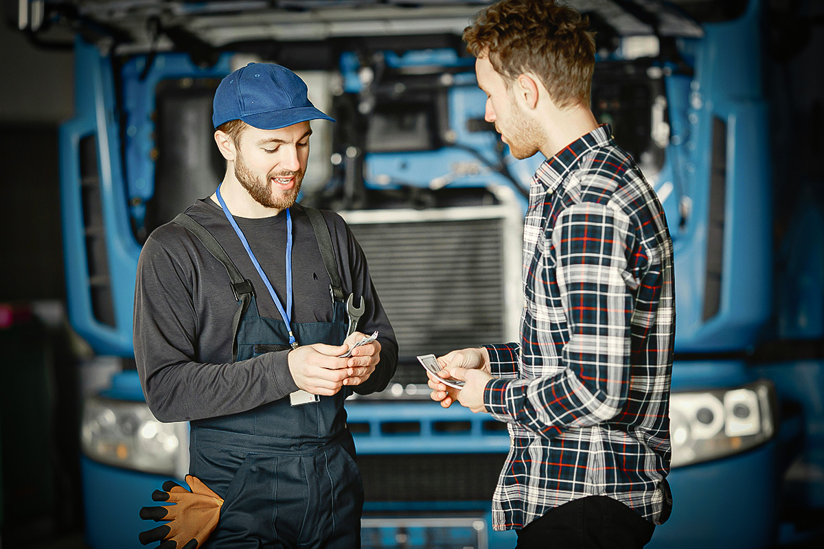 Mechanic And Person Talking